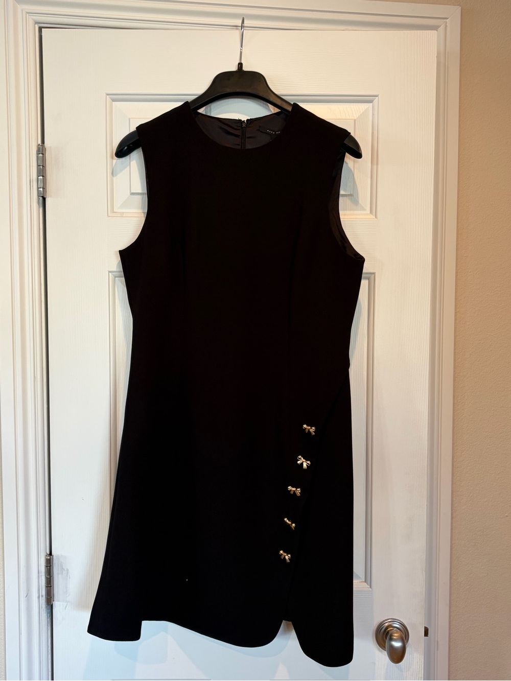 Alex Marie Black Sleeveless Dress with Gold Bow buttons